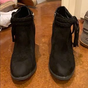 Black booties with braid and fringe